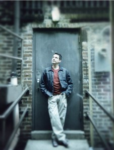 Not me! Notice the fancy hair, brown eyes and lack of a serious beard.